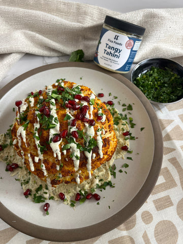 WHOLE ROASTED CAULIFLOWER WITH TANGY TAHINI SAUCE